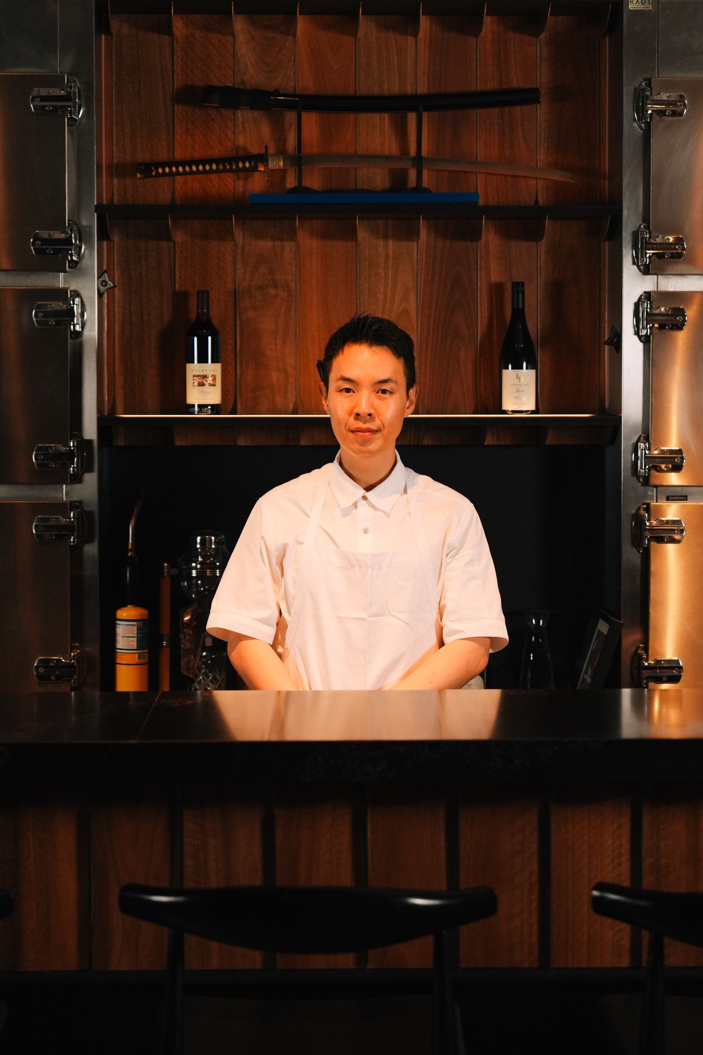 Portrait of the chef at the counter at Ronin Omakase
